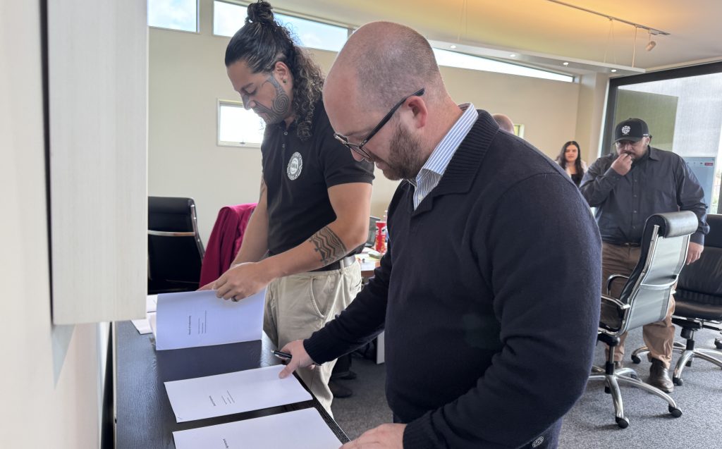 Tāwhiao McMaster and Blair Jamieson sign agreement